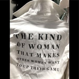 THE KIND OF WOMAN THAT MAKES OTHER WOMEN WANT TO UP THEIR GAME. White Button Up.